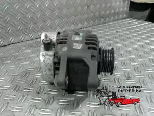 Gebruikte Alternator Nissan Micra (K11) 1.3 LX,SLX 16V Prijs op aanvraag aangeboden door Autosloperij Pieper BV