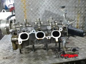 Gebruikte Cilinderkop Mitsubishi Space Star (A0) 1.0 12V Prijs € 210,00 Margeregeling aangeboden door Autosloperij Pieper BV