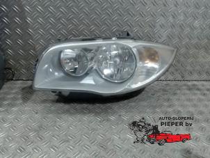 Gebruikte Koplamp links BMW 1 serie (E87/87N) 116i 1.6 16V Prijs € 78,75 Margeregeling aangeboden door Autosloperij Pieper BV