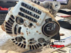 Dynamo van een Toyota Starlet (EP8/NP8) 1.3 Friend,XLi 12V 1992