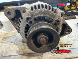 Dynamo van een Toyota Starlet (EP8/NP8) 1.3 Friend,XLi 12V 1992