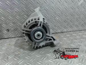 Alternator van een Fiat Grande Punto (199) 1.2 2006