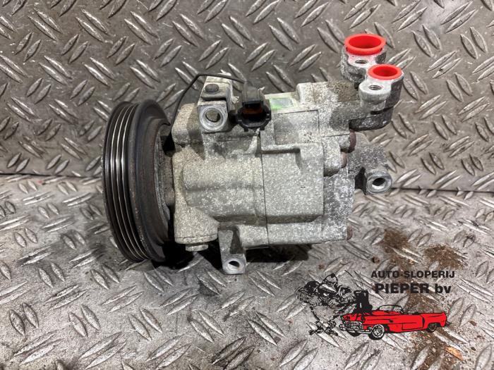 Gebruikte Aircopomp Nissan Micra (K12) 1.2 16V Prijs € 78,75 Margeregeling aangeboden door Autosloperij Pieper BV