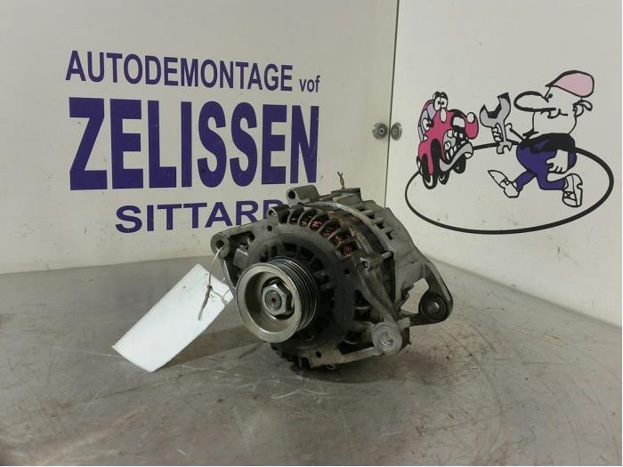 Gebruikte Dynamo Nissan Primera Traveller (W12) 1.8 16V Prijs € 31,50 Margeregeling aangeboden door Zelissen V.O.F. autodemontage