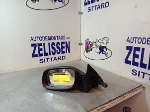 Gebruikte Spiegel Buiten links Opel Astra F (53/54/58/59) 1.6i Prijs € 26,25 Margeregeling aangeboden door Zelissen V.O.F. autodemontage