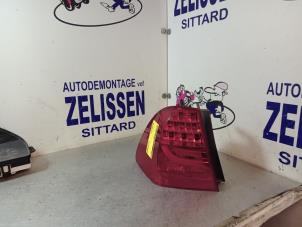 Gebruikte Achterlicht links BMW 3 serie Touring (E91) 318d 16V Prijs € 63,00 Margeregeling aangeboden door Zelissen V.O.F. autodemontage