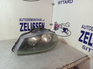 Gebruikte Koplamp links Seat Ibiza III (6L1) 1.4 16V 100 Prijs € 99,75 Margeregeling aangeboden door Zelissen V.O.F. autodemontage