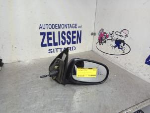 Gebruikte Spiegel Buiten rechts Nissan Almera (N16) 1.5 16V Prijs € 36,75 Margeregeling aangeboden door Zelissen V.O.F. autodemontage