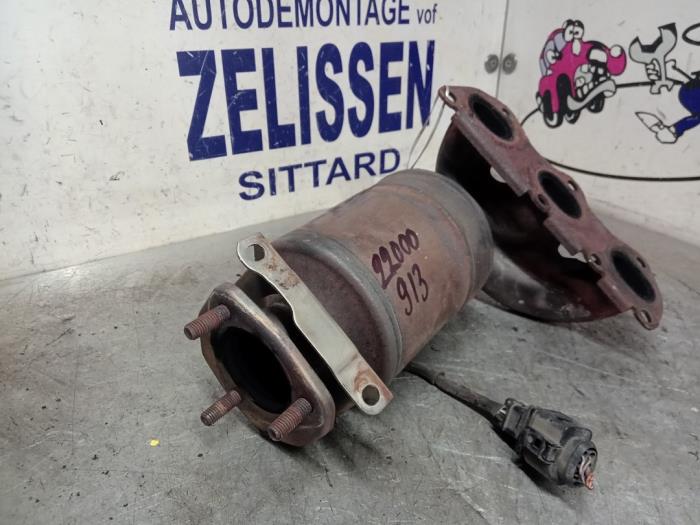 Uitlaatspruitstuk + katalysator van een Seat Ibiza III (6L1) 1.2 12V 2005