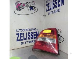 Gebruikte Achterlicht links Opel Astra G (F08/48) 1.2 16V Prijs € 26,25 Margeregeling aangeboden door Zelissen V.O.F. autodemontage