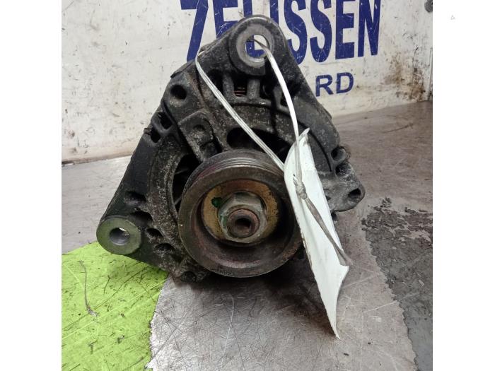 Dynamo van een Fiat Stilo (192A/B) 2.4 20V Abarth 3-Drs. 2004