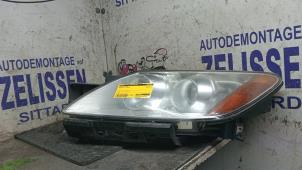 Gebruikte Koplamp links Mazda CX-7 2.3 MZR DISI Turbo 16V Prijs € 393,75 Margeregeling aangeboden door Zelissen V.O.F. autodemontage