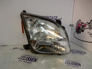 Gebruikte Koplamp rechts Suzuki New Ignis (MH) 1.3 16V Prijs € 52,50 Margeregeling aangeboden door Zelissen V.O.F. autodemontage