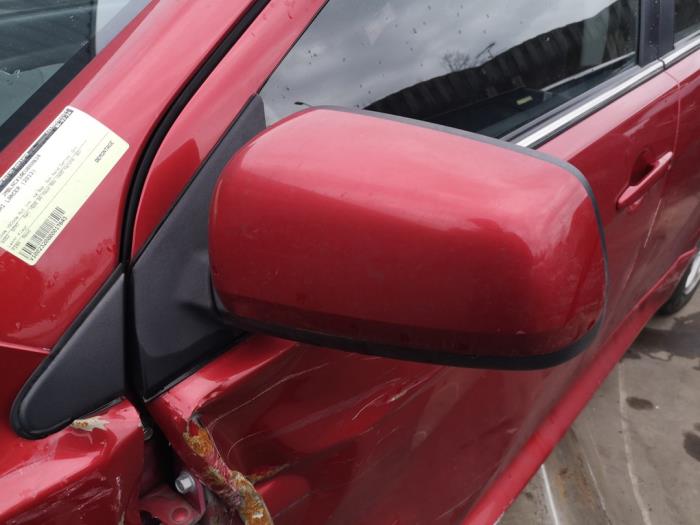 Buitenspiegel links van een Mitsubishi Lancer Sportback (CX) 1.6 MIVEC 16V 2013