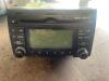 Radio van een Hyundai i30 (FD), 2007 / 2011 1.4 CVVT 16V, Hatchback, Benzine, 1.396cc, 80kW (109pk), FWD, G4FA, 2007-10 / 2011-11, B5P2; B5P8; B5PC; B5PG 2009