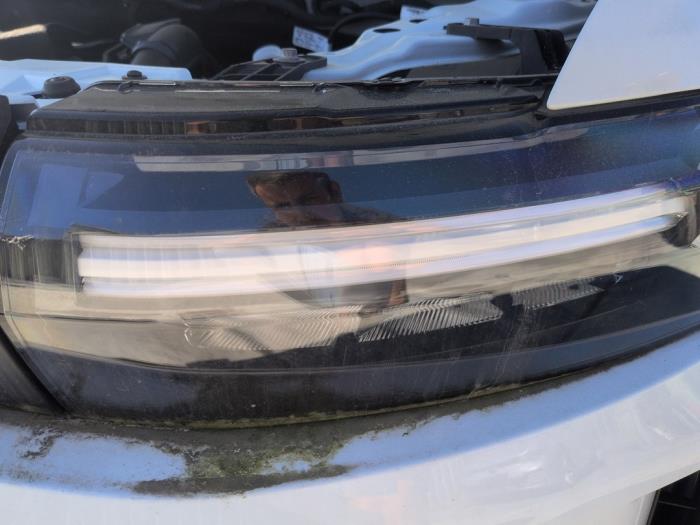 Koplamp links van een Dacia Duster (DJF) 1.0 Eco-G 12V 2024