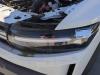 Koplamp links van een Dacia Duster (DJF), 2023 1.0 Eco-G 12V, SUV, 999cc, 74kW (101pk), FWD, H4D480; H4DF4, 2023-11, PE2MT6W; RESMT6W 2024