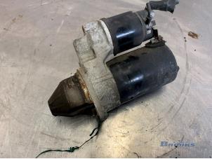 Gebruikte Startmotor Opel Corsa C (F08/68) 1.0 12V Twin Port Prijs € 20,00 Margeregeling aangeboden door Autobedrijf Brooks