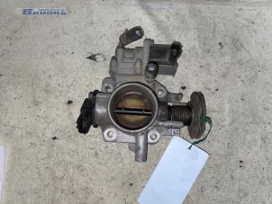 Gebruikte Gasklephuis Mazda 323 C (BA13) 1.5i 16V Prijs € 20,00 Margeregeling aangeboden door Autobedrijf Brooks