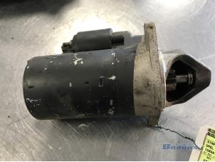 Gebruikte Startmotor Opel Corsa B (73/78/79) 1.0i 12V Prijs € 20,00 Margeregeling aangeboden door Autobedrijf Brooks