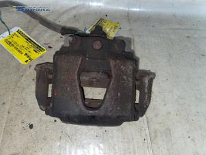 Gebruikte Remklauw (Tang) rechts-voor Opel Tigra (75) 1.4i 16V Prijs op aanvraag aangeboden door Autobedrijf Brooks