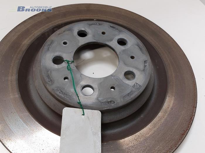 Remschijf achter van een Tesla Model 3 Long Range AWD 75 kWh 2019