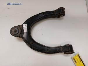 Gebruikte Draagarm rechts-voor Tesla Model 3 Long Range AWD 75 kWh Prijs € 50,00 Margeregeling aangeboden door Autobedrijf Brooks