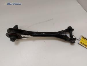 Gebruikte Draagarm links-achter Tesla Model 3 Long Range AWD 75 kWh Prijs € 25,00 Margeregeling aangeboden door Autobedrijf Brooks