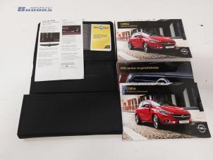 Gebruikte Instructie Boekje Opel Corsa E 1.0 SIDI Turbo 12V Prijs € 25,00 Margeregeling aangeboden door Autobedrijf Brooks