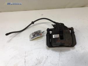 Gebruikte Remklauw (Tang) rechts-voor Citroen C2 (JM) 1.6 16V VTR Prijs € 15,00 Margeregeling aangeboden door Autobedrijf Brooks