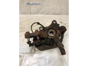 Gebruikte Asschenkel links-voor Opel Combo Tour (Corsa C) 1.4 16V Twin Port Prijs € 20,00 Margeregeling aangeboden door Autobedrijf Brooks