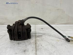 Gebruikte Remklauw (Tang) rechts-voor Smart Fortwo Coupé (450.3) 0.7 Prijs € 25,00 Margeregeling aangeboden door Autobedrijf Brooks