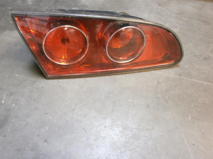Achterlicht links van een Seat Ibiza III (6L1) 1.4 16V 75 2003