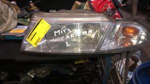Gebruikte Linker Koplamp Mitsubishi Carisma 1.6i 16V Prijs € 42,00 Margeregeling aangeboden door van de Bunte Teuge B.V.