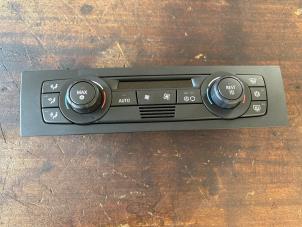 Gebruikte Chaufage Bedieningspaneel BMW 1 serie (E87/87N) 118i 16V Prijs € 52,50 Margeregeling aangeboden door van de Bunte Teuge B.V.