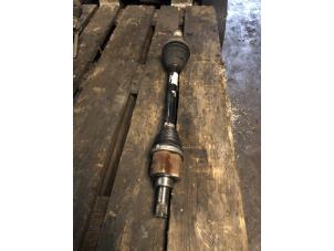 Gebruikte Aandrijfas links-voor Volkswagen Polo V (6R) 1.0 12V BlueMotion Technology Prijs € 131,25 Margeregeling aangeboden door van de Bunte Teuge B.V.