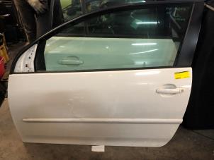 Gebruikte Portier 2Deurs links Volkswagen Golf V (1K1) 1.4 TSI 122 16V Prijs € 75,00 Margeregeling aangeboden door van de Bunte Teuge B.V.