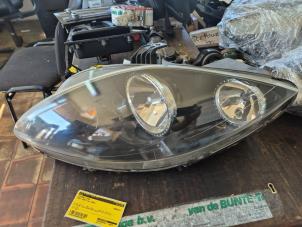 Gebruikte Koplamp links Seat Leon (1P1) 1.6 Prijs € 78,75 Margeregeling aangeboden door van de Bunte Teuge B.V.