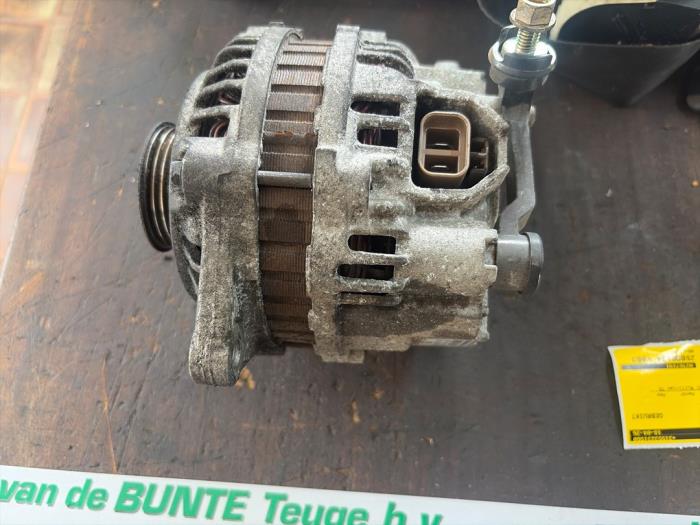 Gebruikte Dynamo Mazda 323 Fastbreak (BJ14) 1.6 16V Autom. Prijs € 47,25 Margeregeling aangeboden door van de Bunte Teuge B.V.