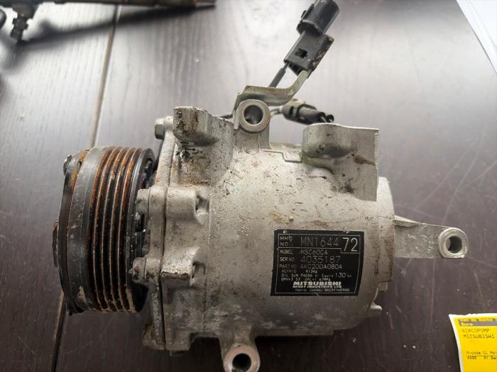 Gebruikte Aircopomp Mitsubishi Colt (Z2/Z3) 1.3 16V Prijs € 120,75 Margeregeling aangeboden door van de Bunte Teuge B.V.