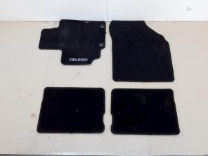 Gebruikte Matten Set Suzuki Celerio (LF) 1.0 12V Dualjet Prijs € 72,00 Margeregeling aangeboden door Van Gils Automotive