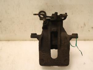 Gebruikte Remklauw (Tang) links-achter Ford Focus 1 Wagon 1.8 TDCi 100 Prijs € 65,00 Margeregeling aangeboden door Van Gils Automotive