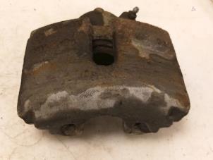 Gebruikte Remklauw (Tang) links-voor Volkswagen Golf Plus (5M1/1KP) 1.6 FSI 16V Prijs € 45,00 Margeregeling aangeboden door Van Gils Automotive