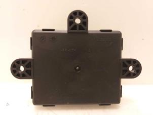 Gebruikte Module Centrale Deurvergrendeling Ford Grand C-Max (DXA) 1.6 TDCi 16V Van Prijs € 30,00 Margeregeling aangeboden door Van Gils Automotive