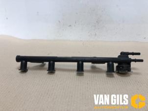 Gebruikte Injector brug Ford Fiesta 5 (JD/JH) 1.3 Prijs € 50,00 Margeregeling aangeboden door Van Gils Automotive