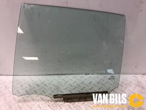 Gebruikte Portierruit 4Deurs links-achter Toyota Yaris II (P9) 1.0 12V VVT-i Prijs € 45,00 Margeregeling aangeboden door Van Gils Automotive