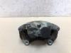 Nissan Qashqai (J12) 1.5 VC-T e-Power 16V Remklauw (Tang) links-voor