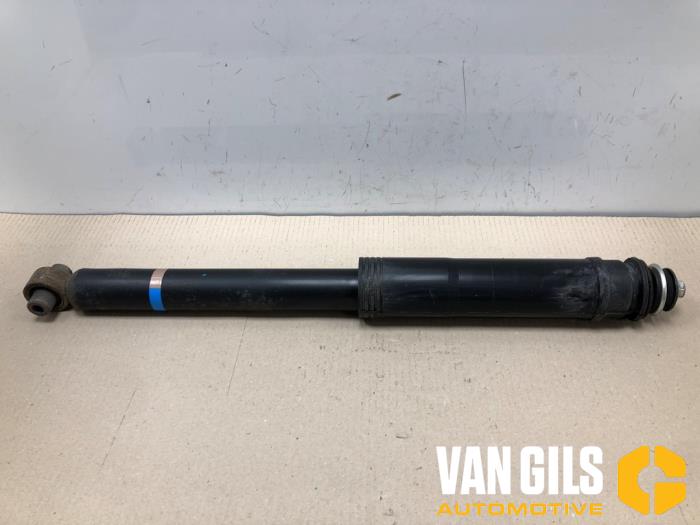Schokdemper links-achter van een Toyota Auris (E15) 1.8 16V HSD Full Hybrid 2012