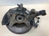 Asschenkel links-voor van een Toyota Auris (E15) 1.8 16V HSD Full Hybrid 2012
