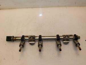 Gebruikte Injector brug Volkswagen Golf VII (AUA) 1.4 TSI 16V Prijs € 75,00 Margeregeling aangeboden door Van Gils Automotive